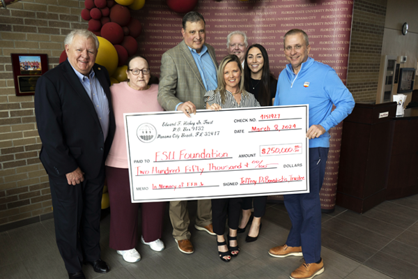 From left are John Reichard, former Panama City Beach City Council member; Marilyn Petry, former office manager for Ed Hickey; Jeffrey DiBenedictis and Tanya DiBenedictis of the Edward F. Hickey Jr. Trust; FSU PC Dean Randy Hanna; Katie May, director of Development for Panama City with the FSU Foundation; and Frank Hall, FSU Foundation trustee.